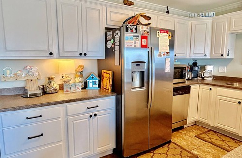 Tranquil Harbour Condo | OW 3201-Flirty Flamingo: Oceanview condo in Oak Island, sleeps 10, pet-friendly.