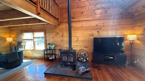Rileyville House | Peaceful Log Cabin on Private Acres with Creek & Pond in Rileyville, Virginia