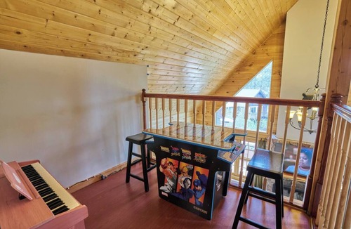 Whispering Forest Cabin | Peaceful Rustic Escape, Cool Deck with Firepit Table - No Better Escape than Our Private Lot - 3BR w/Game Loft, Pac Man tabletop games console!