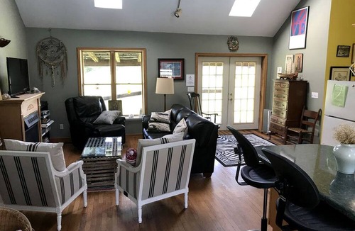 Crofton Cabin | Pet-Friendly Log Cabin with an Outdoor Pool near Crofton, Kentucky