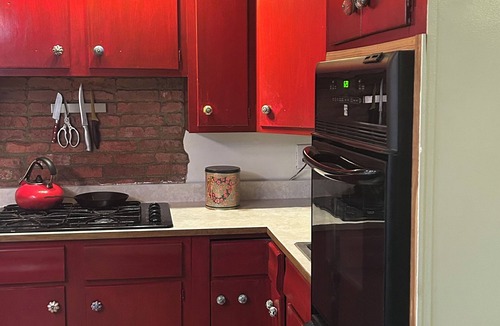 Versailles House | Red roof bungalow minutes from Keeneland race course bourbon trail. Hot tub