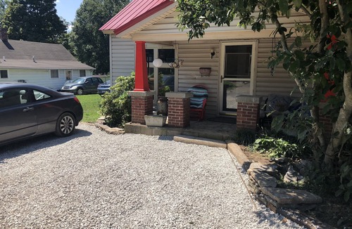 Versailles House | Red roof bungalow minutes from Keeneland race course bourbon trail. Hot tub