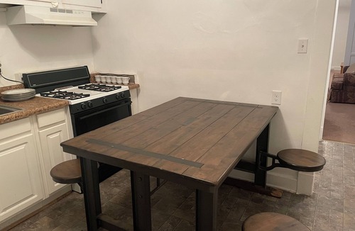Mosby House | Relax in beautiful second floor apartment with balcony & private fenced yard.