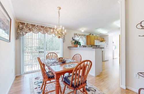 Sparta House | Riverfront home with a large yard, fireplace, deck, & washer/dryer