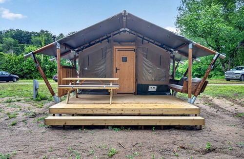 New River RV Rental | Riverfront Safari Tent with Scenic Views and Deck in Blacksburg, Virginia