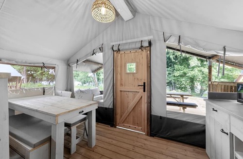 New River RV Rental | Riverfront Safari Tent with Scenic Views and Deck in Blacksburg, Virginia