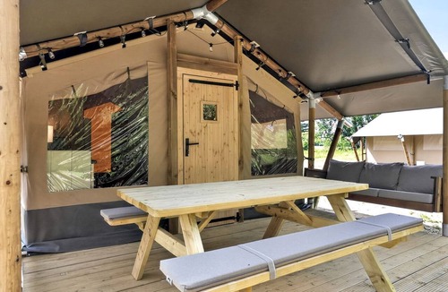 New River RV Rental | Riverfront Safari Tent with Scenic Views and Deck in Blacksburg, Virginia