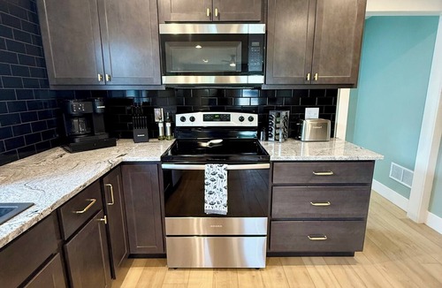 Crystal City House | Ruby Red Crystal House: 2BD/2BA Walk to Dining & Coffee, Minutes from Major Hwy