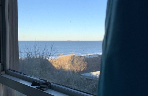 Cottage Line Apartment | Rustic Rooftop Delight - Bay Front by RedAwning