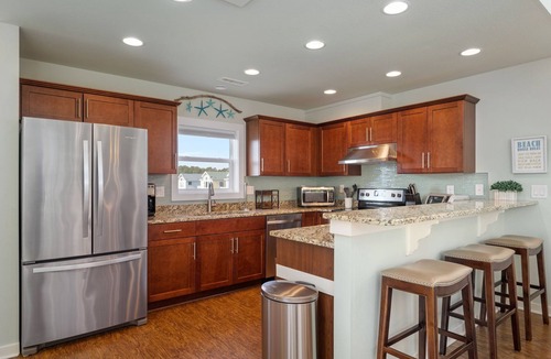Whalehead Beach House | Salty Breeze: Oceanside, Elevator,Hot Tub, Community Pool Access!