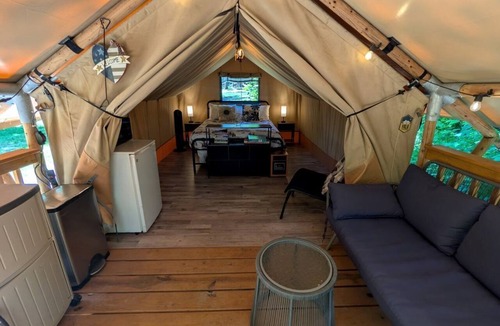 Coalmont RV Rental | Secluded Off-Grid Glamping Tent with Private Bathhouse Near The Caverns & Waterfalls – Coalmont, Tennessee