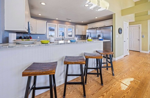 Wind Over Waves House | SemiSoundfront Dog Friendly w/Pool, Elevator, Hot Tub, Tiki Bar, Cmty Boat Ramp