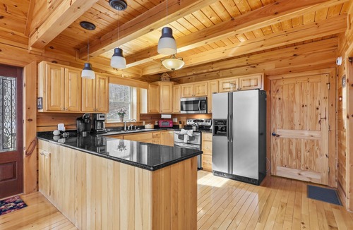 Todd Cabin | Serene Creek Cabin w/Fire Pit, Air Hockey, Pool, Yard, Pet Friendly near Todd!
