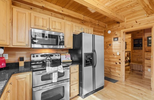 Todd Cabin | Serene Creek Cabin w/Fire Pit, Air Hockey, Pool, Yard, Pet Friendly near Todd!