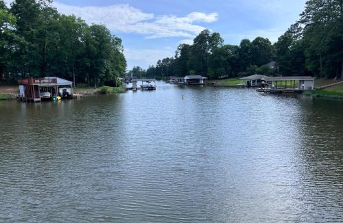 Henrico House | Serenity at the Lake Gaston Peaceful, Waterfront, 3 King Bed, Water Toys, Firepit