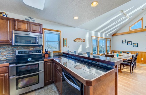 Koru Village House | Soundside Dog Friendly Cottage w/Hot Tub and Nearby Beach Access