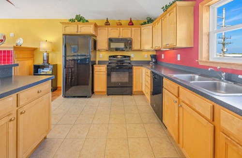 Wind Over Waves House | Soundside Dog Friendly Home w/Pool, Hot Tub, Game Room, Community Boat Ramp