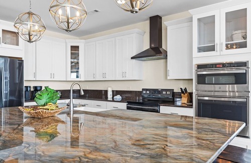 Oak Island House | Spacious 10-bedroom oceanfront house with pool, perfect for large groups.