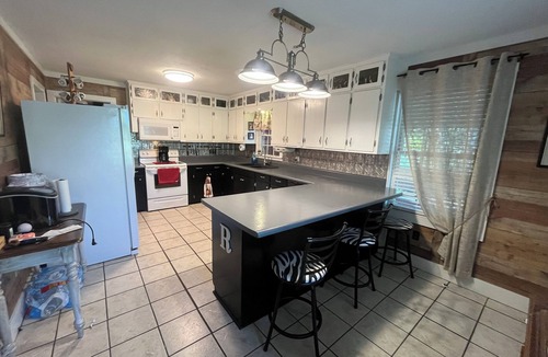 Centre House | Spacious 4 bedroom home with plenty of room for parking.