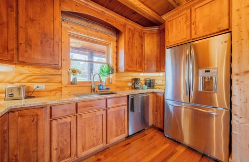 Allisonia House | Spacious log cabin with game room, large deck, and a quiet serene location for relaxed family getaways.