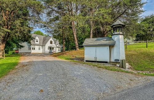 Goodview House | Still Waters - Lakefront luxury home with views, dock, home theater & game room