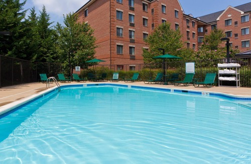 McLean Apartment | Studio Suite with Private Patio! Free Breakfast + On-Site Business Center