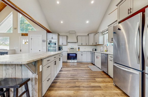 Lakeside Estates House | Stunning Lakeview Home with game room, fire pit, dock, & hot tub