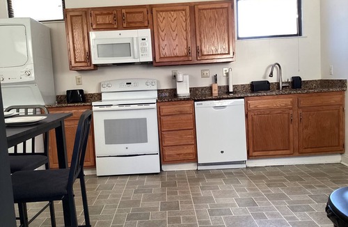 Downtown Greensboro Apartment | Stylish Bedroom Escape-Warm & Relaxing Ambiance in lovely Greensboro with AC