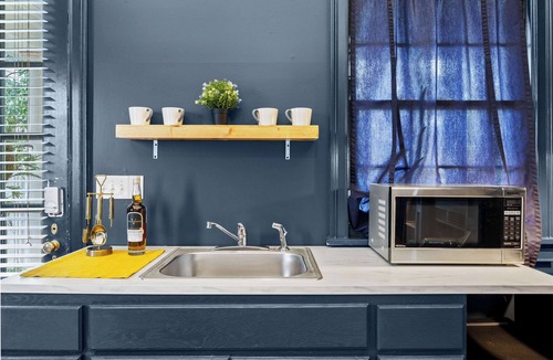 Cherokee Triangle Apartment | Stylish king studio in the heart of the Highlands