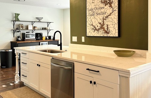 Milledgeville House | Summertime is calling Lake Sinclair rental with dock and Kayaks sleeps 6-7!