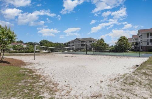 North Myrtle Beach Apartment | Sunny Spacious 2nd Floor Family Coastal Retreat