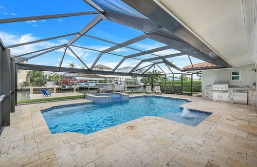 Connors House | Sunsations | Waterfront Home with Private Dock | Saltwater Pool & Spa