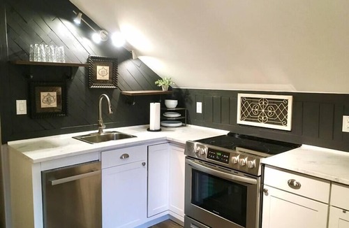 Long View Apartment | The Cupboard Above the Stairs