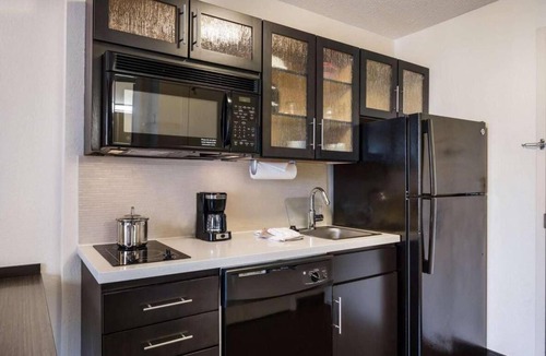 Schiller Park Hotel | THREE Relaxing 1BR Suites with Full Kitchen, Free Airport Shuttle, Pet-friendly!