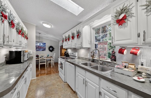 Whittier House | Twin Ponds Retreat-Pond/Hot Tub/Fire Pit/Game Room/Pet Friendly by RedAwning
