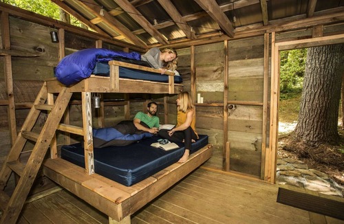Zirconia Cabin | Unique Barnwood Cabin Retreat with Fire Pit and Outdoor Adventure in Zirconia, North Carolina