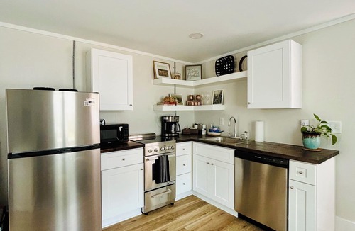 West Southern Pines House | Walkable Cottage, Pet Friendly with Fenced Patio