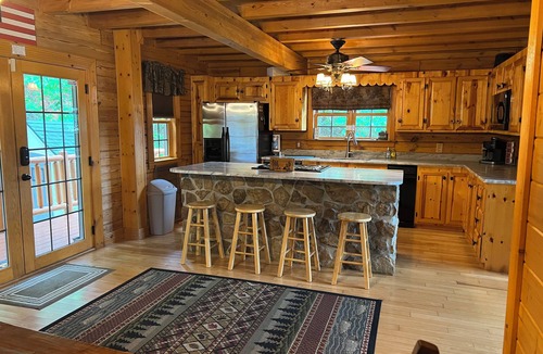 La Follette House | Water front log cabin and dock on Norris Lake, perfect for your family vacation!