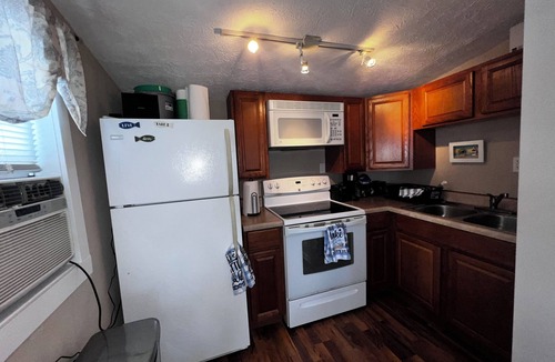 Norway Cottage | Waterfront 2BR Cottage: Fire Pit, Grill & Dock -Boat Slip Available additional