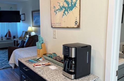 Huddleston Condo | Waterfront Condo with Pool for Romantic Getaways and Fisherman. Pet Friendly!