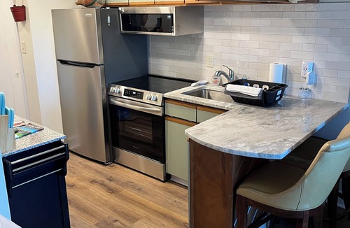 Huddleston Condo | Waterfront Condo with Pool for Romantic Getaways and Fisherman. Pet Friendly!
