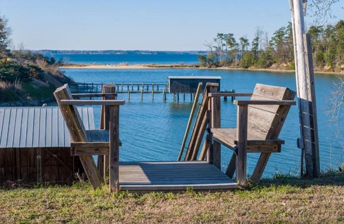 Topping House | Waterfront Home with pool dock gameroom and kayaks