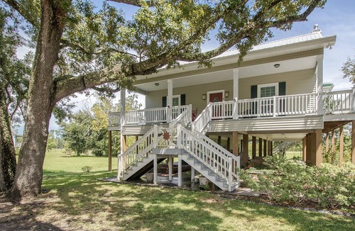 Henderson Point House | Your Only Worry Should Be If The Tide Is Going To Reach Your Chair!