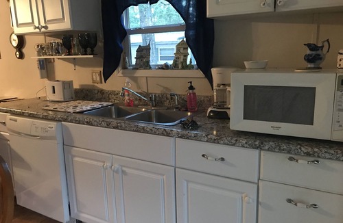 Supply House | Your perfect beach vacation home! Quiet neighborhood, sunroom, at beach in 4 min