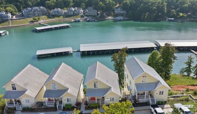 4-bedroom condo in charming Deerfield with WiFi, AC, Covered Decks, & Boat Slip.