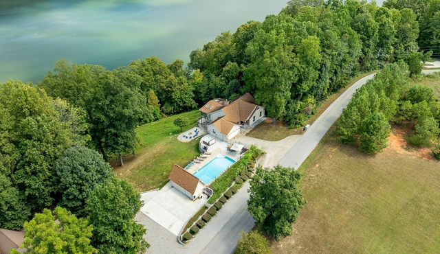 6 Bedroom home, heated private pool, person Hot tub, Waterfront Views, and more