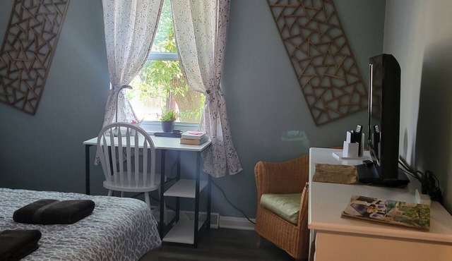 A beautiful and cozy yellow house. The house is divided into 2 separate apartments.