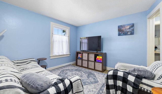 Charming Apartment by Lakeside Park | Garden Views