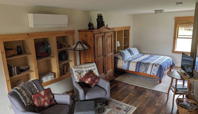 Charming loft above barn, 10 min. from Boone, with gardens, chickens and views.