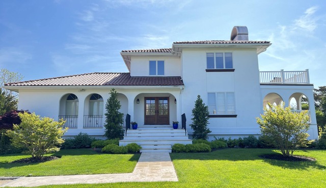 Charming Spanish villa with heated pool in West Hampton Beach in prime location in Westhampton Beach
